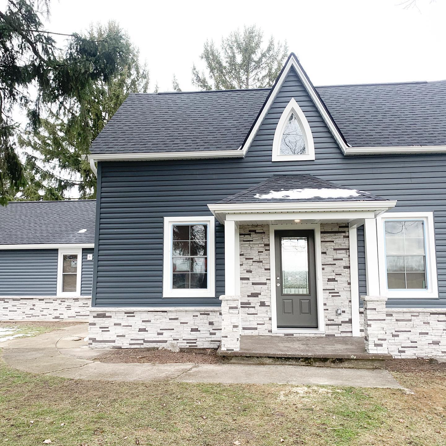 Norfolk County home exterior renovation The Haines group front yard stone work windows doors roofing